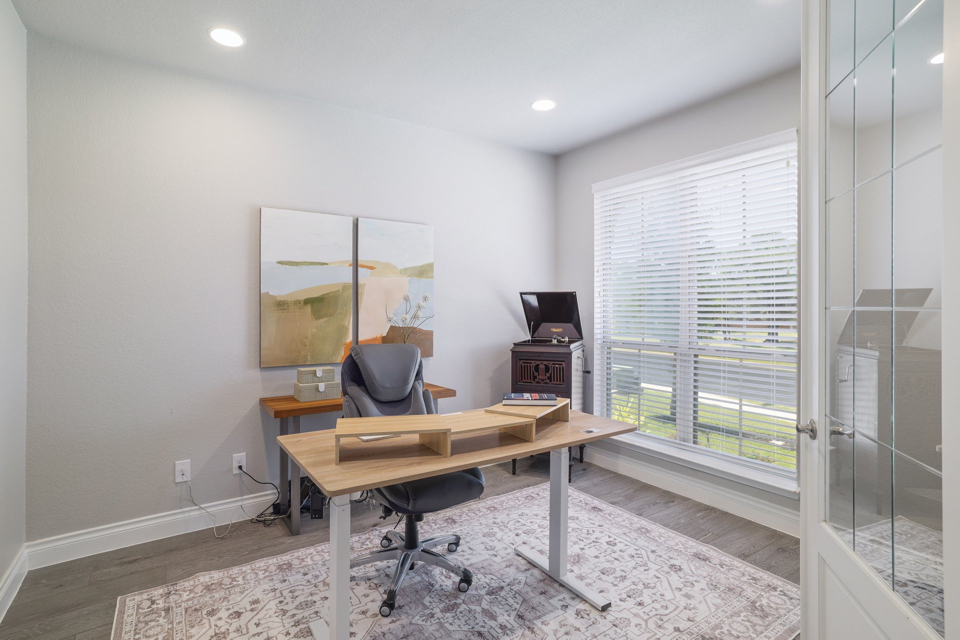 1513 Lakeside Ranch Road Georgetown, TX 78633 - Photo 23 of 40 Office area featuring light wood finished floors, recessed lighting, and french doors