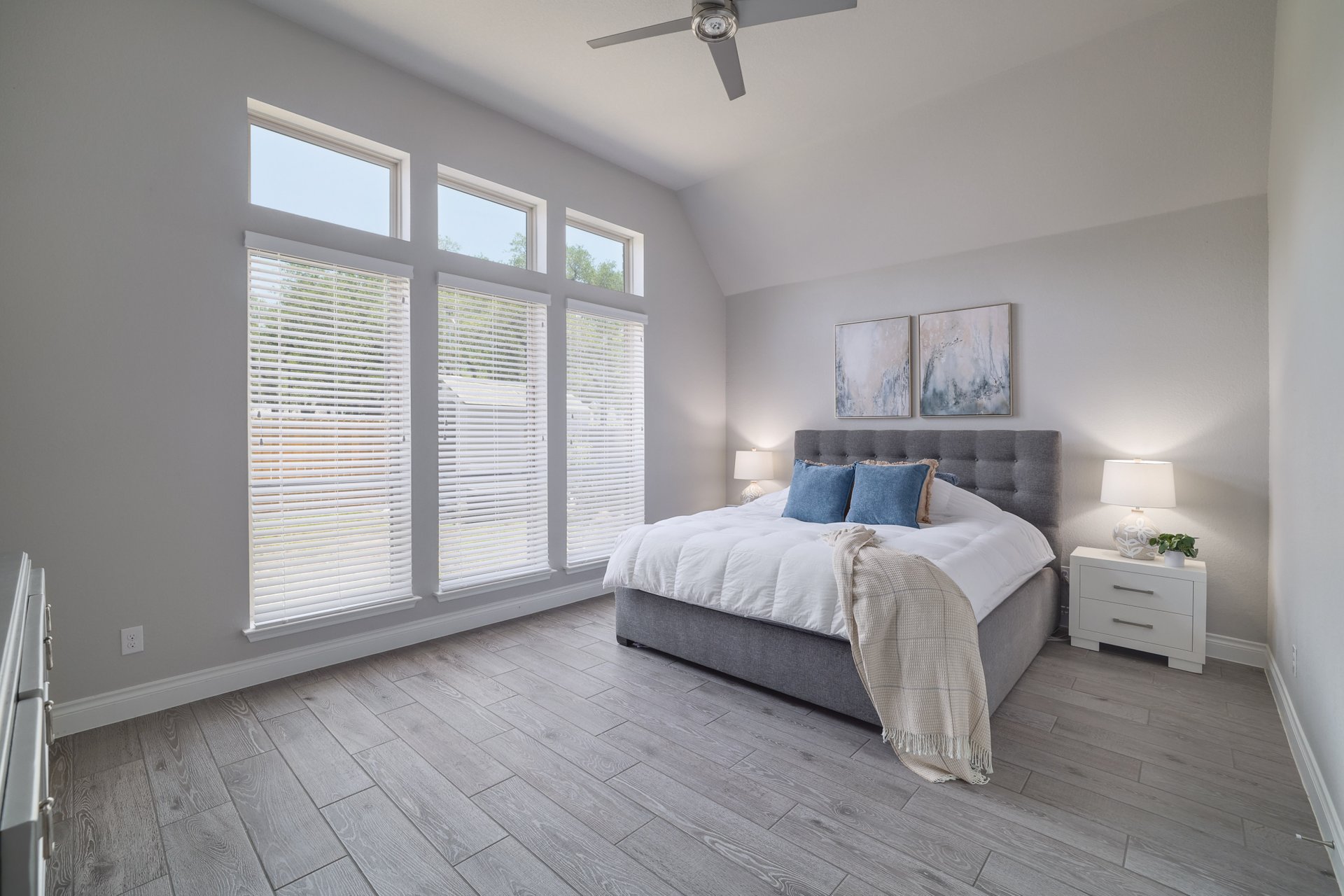 1513 Lakeside Ranch Road Georgetown, TX 78633 - Photo 24 of 40 Bedroom featuring light wood-type flooring, ceiling fan, and vaulted ceiling