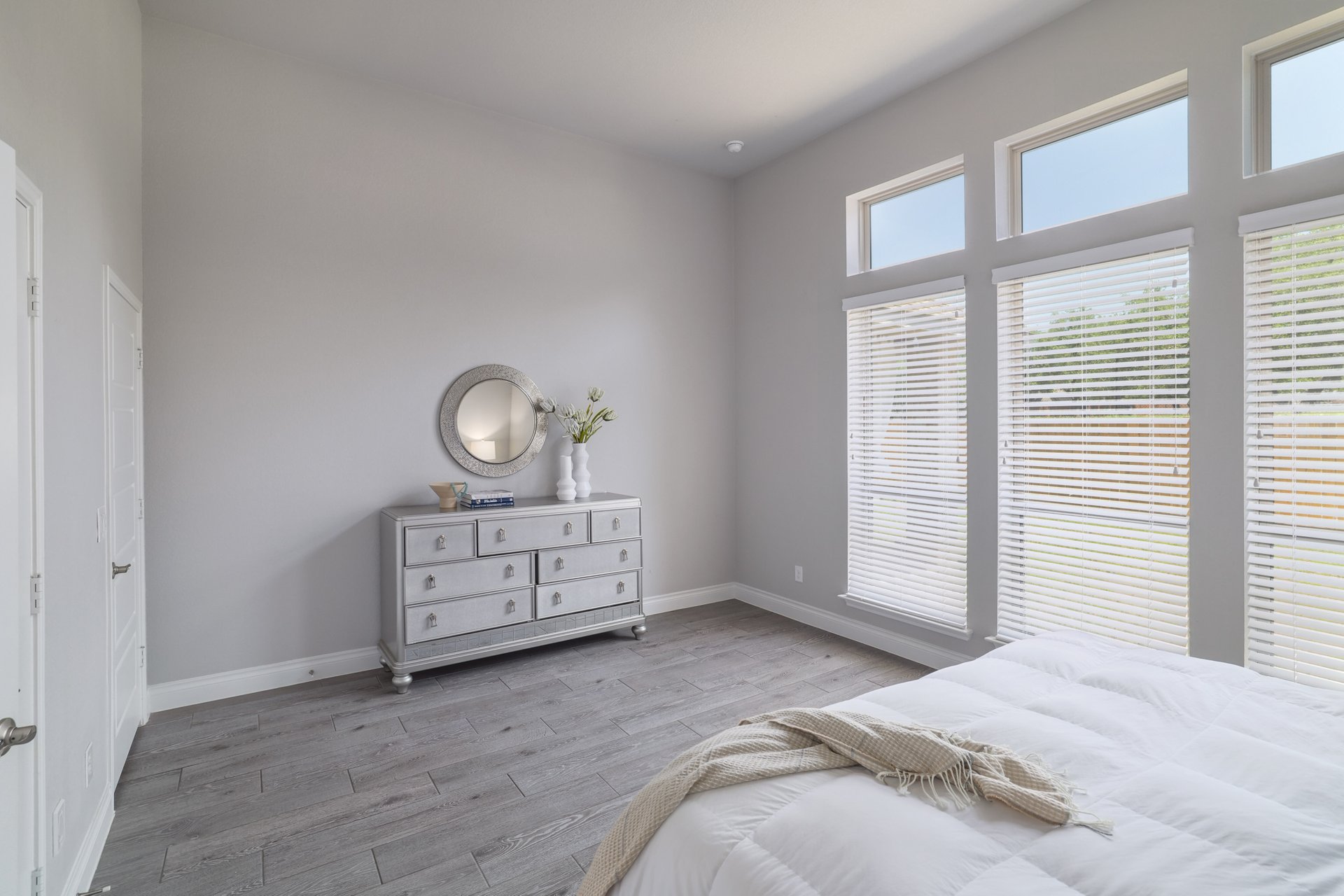 1513 Lakeside Ranch Road Georgetown, TX 78633 - Photo 25 of 40 Bedroom with light wood-style floors and baseboards
