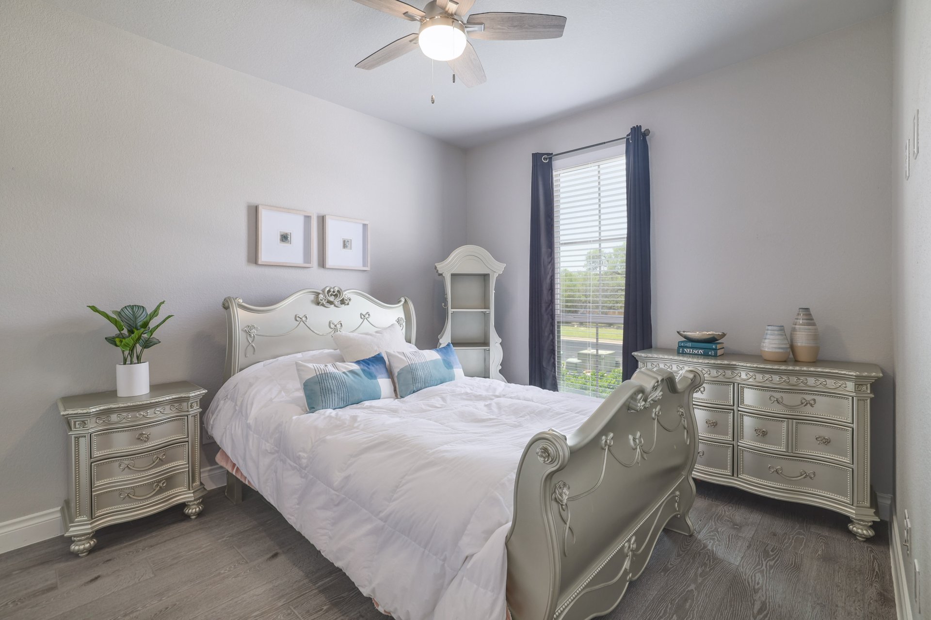 1513 Lakeside Ranch Road Georgetown, TX 78633 - Photo 31 of 40 Bedroom with dark wood-style flooring and a ceiling fan