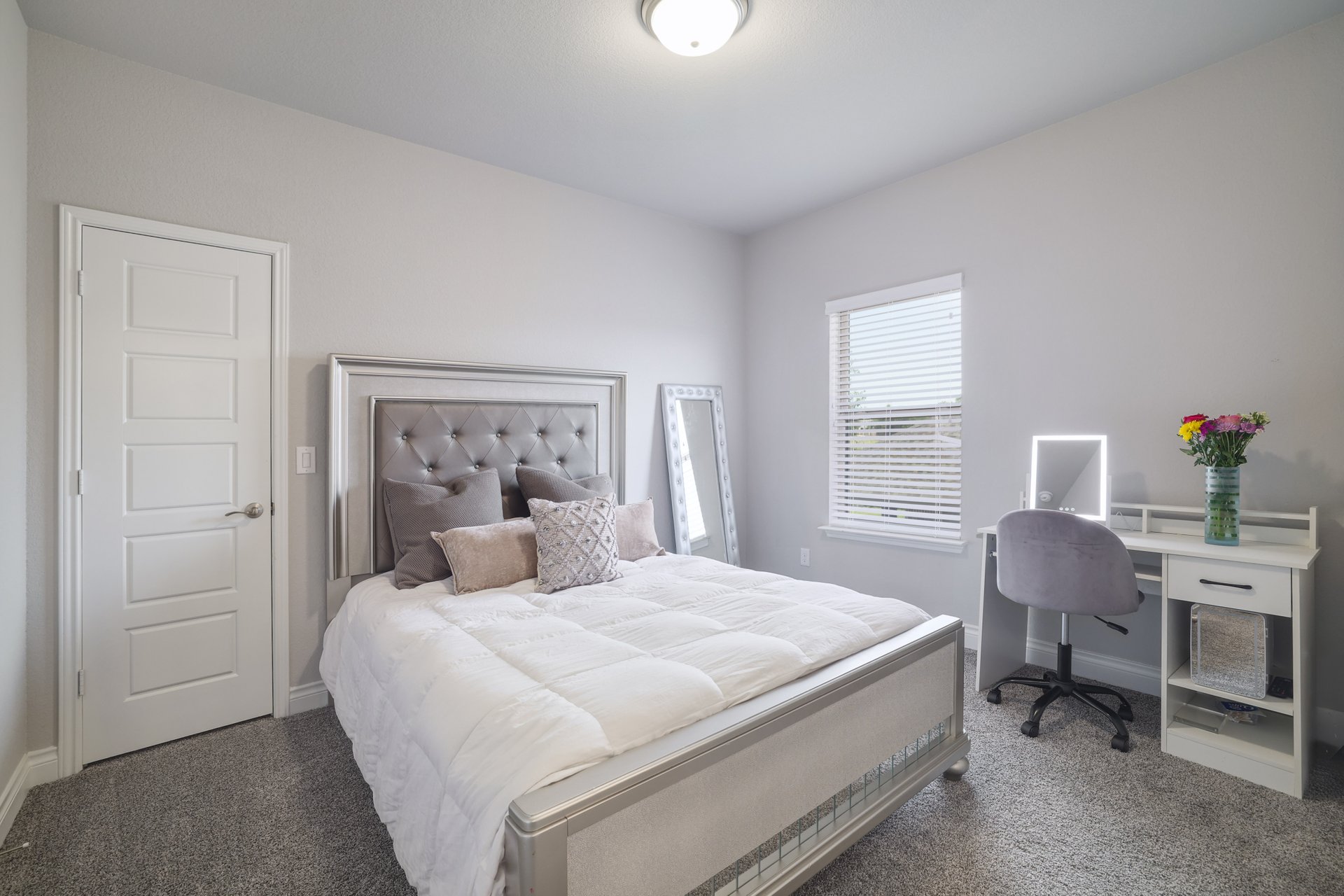 1513 Lakeside Ranch Road Georgetown, TX 78633 - Photo 36 of 40 Bedroom featuring dark carpet and an office area