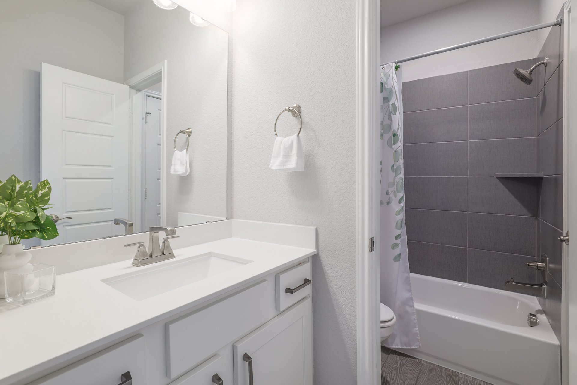 1513 Lakeside Ranch Road Georgetown, TX 78633 - Photo 37 of 40 Full bathroom featuring vanity and shower / bathtub combination with curtain