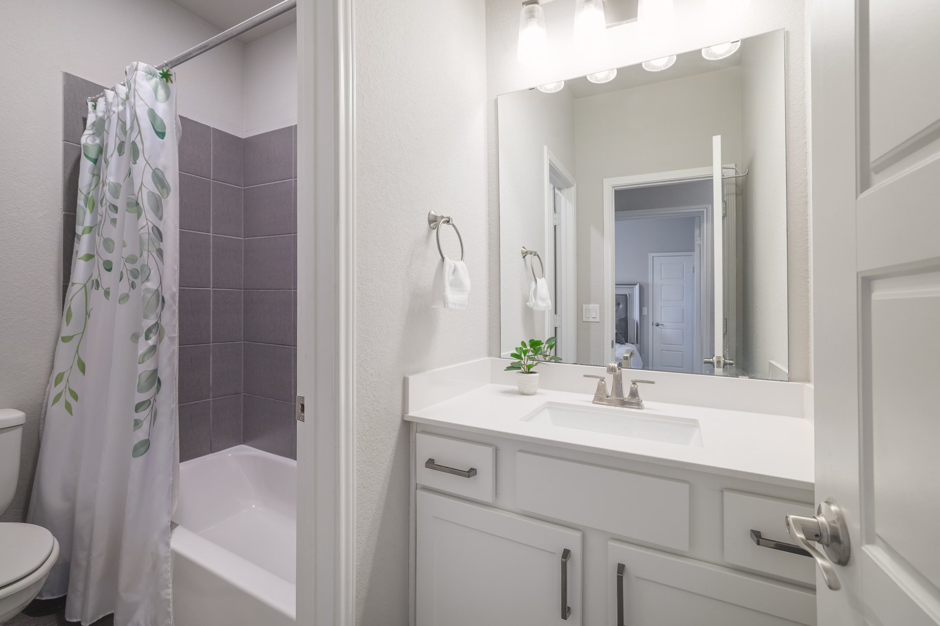 1513 Lakeside Ranch Road Georgetown, TX 78633 - Photo 40 of 40 Full bathroom with vanity and shower / bathtub combination with curtain