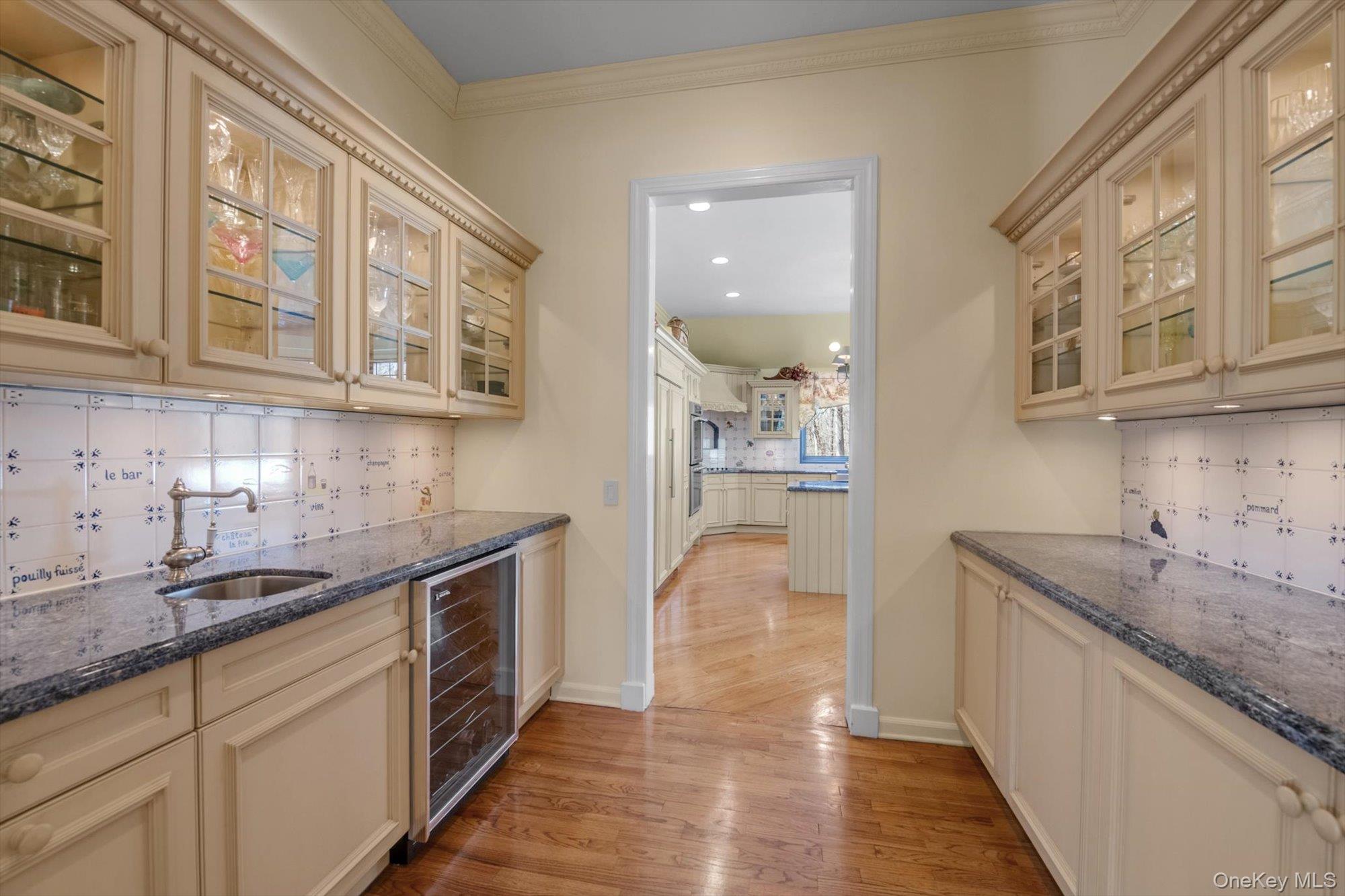 12 Overlook Court Locust Valley, NY 11560 - Photo 11 of 49 a kitchen with stainless steel appliances granite countertop a sink and cabinets