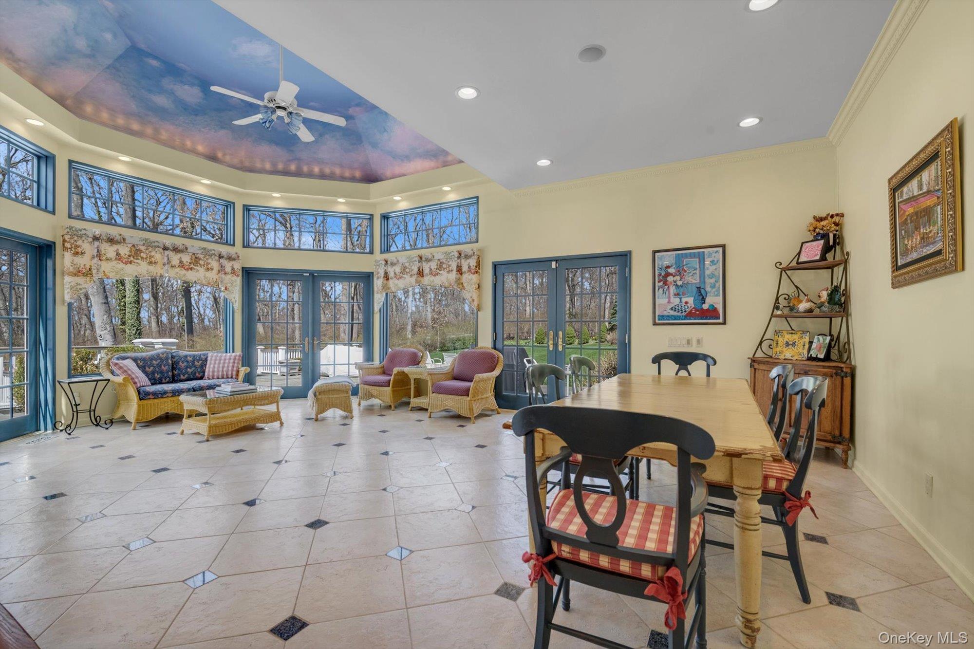 12 Overlook Court Locust Valley, NY 11560 - Photo 15 of 49 a living room with furniture and a floor to ceiling window
