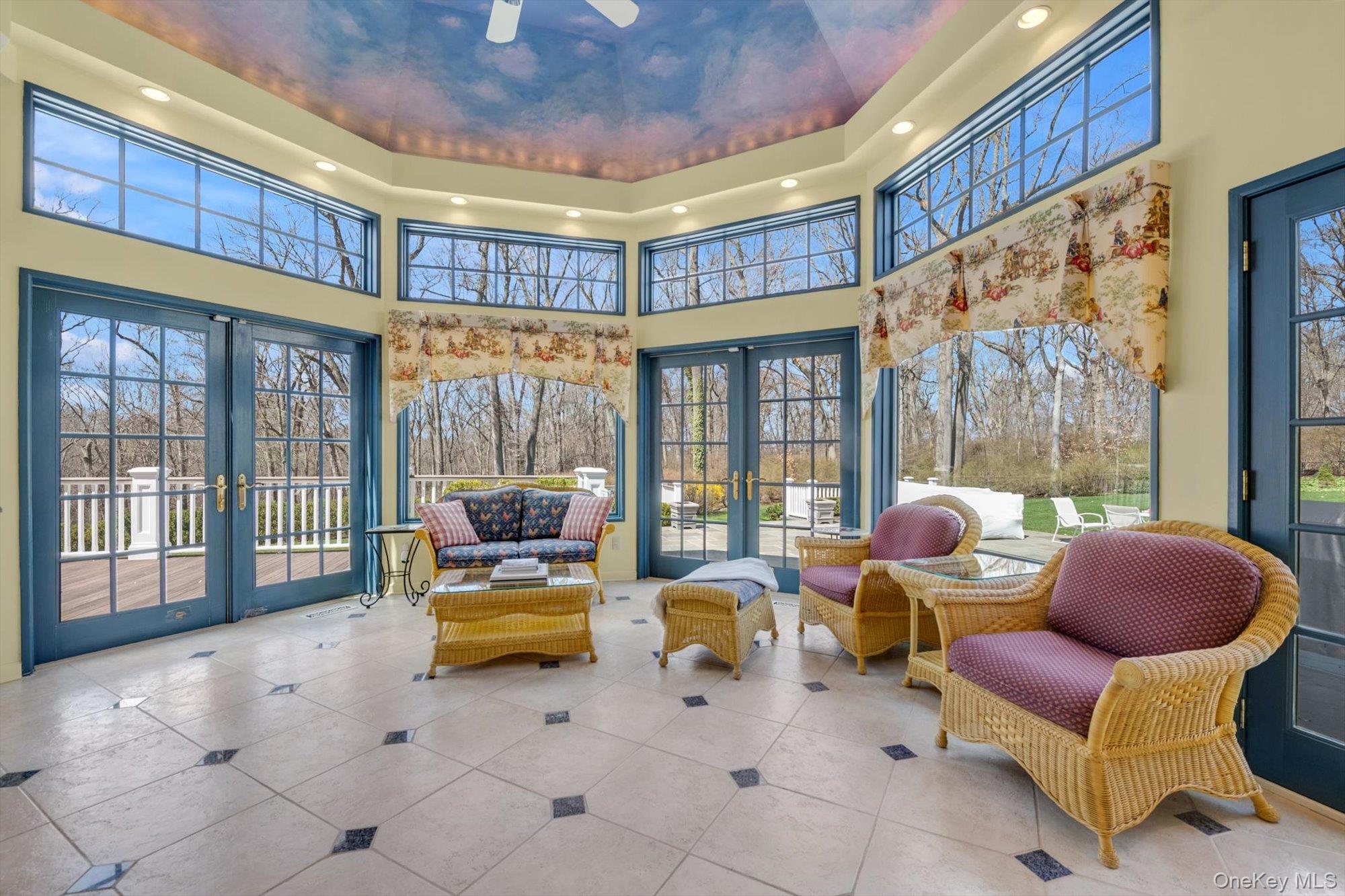 12 Overlook Court Locust Valley, NY 11560 - Photo 16 of 49 a living room with furniture and a large window