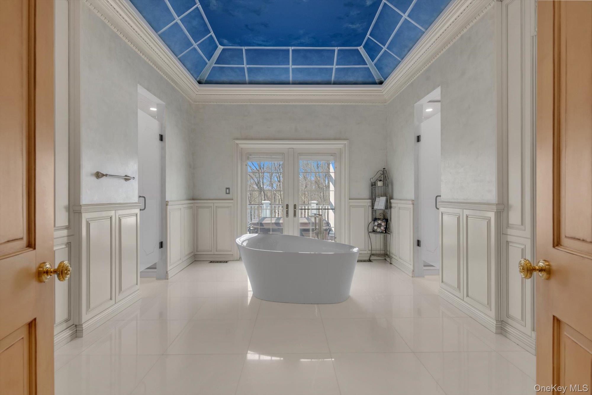 12 Overlook Court Locust Valley, NY 11560 - Photo 21 of 49 a view of a big room with wooden floor and windows