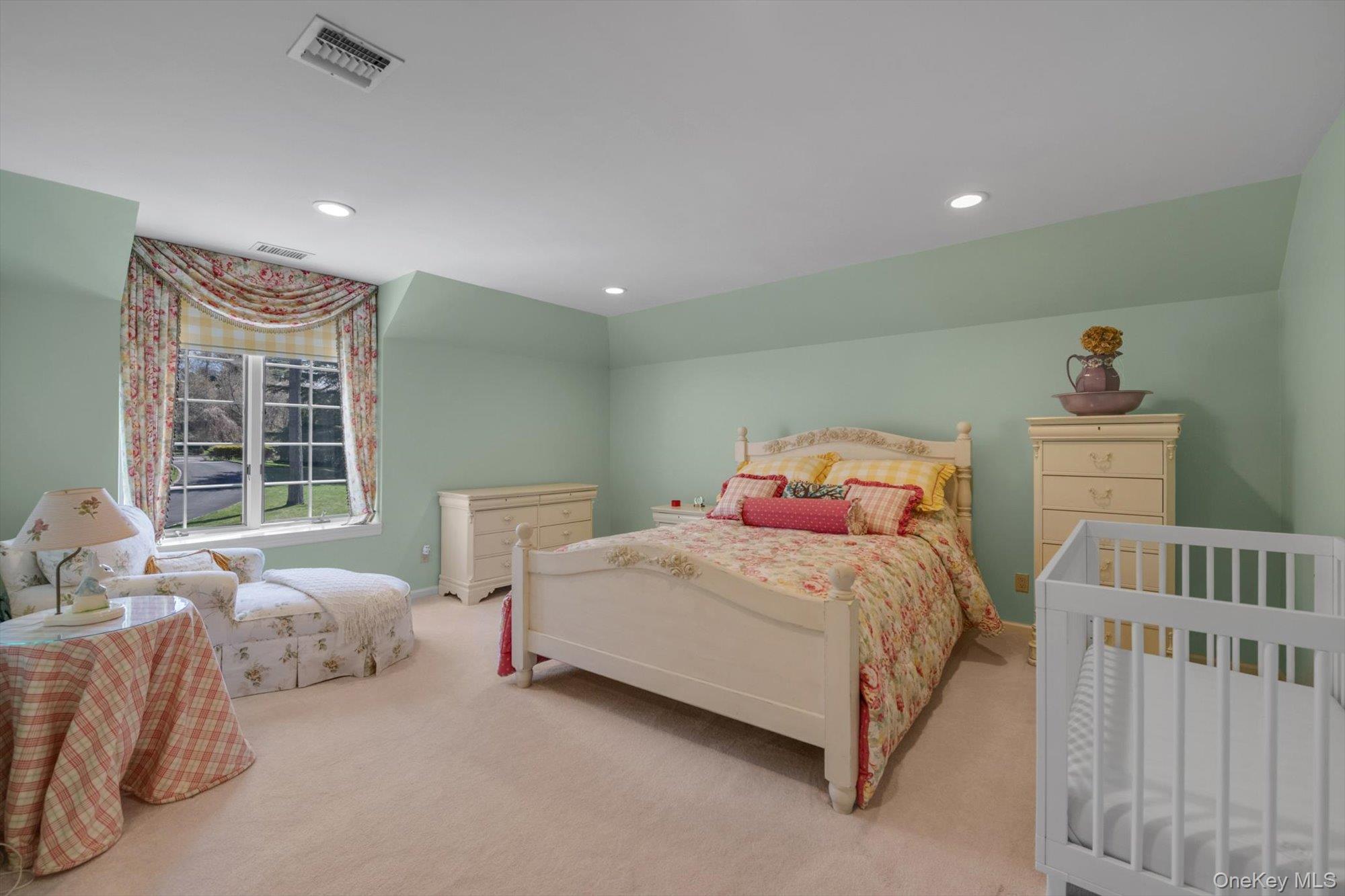 12 Overlook Court Locust Valley, NY 11560 - Photo 26 of 49 a bedroom with a bed and window