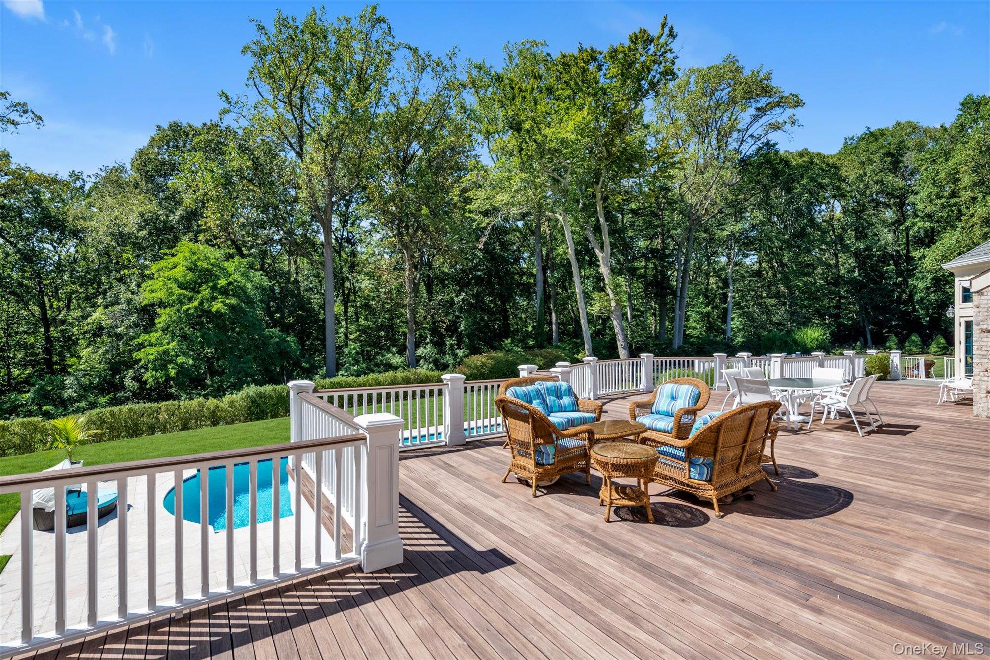 12 Overlook Court Locust Valley, NY 11560 - Photo 37 of 49 a view of backyard with a deck and furniture