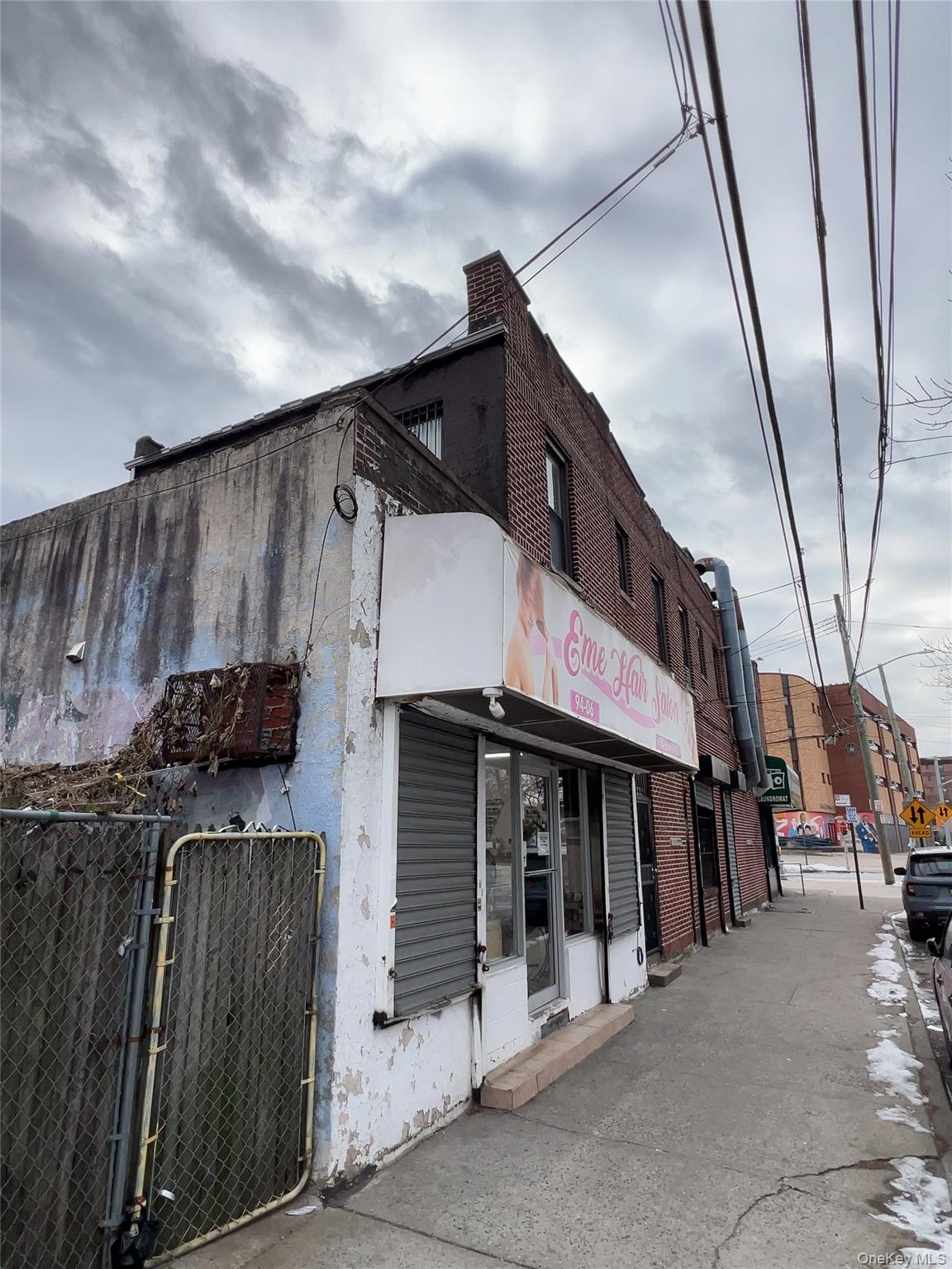 32-01 Junction Boulevard, Unit 4 Queens, NY 11369 - Photo 2 of 14 a view of a car park in front of house