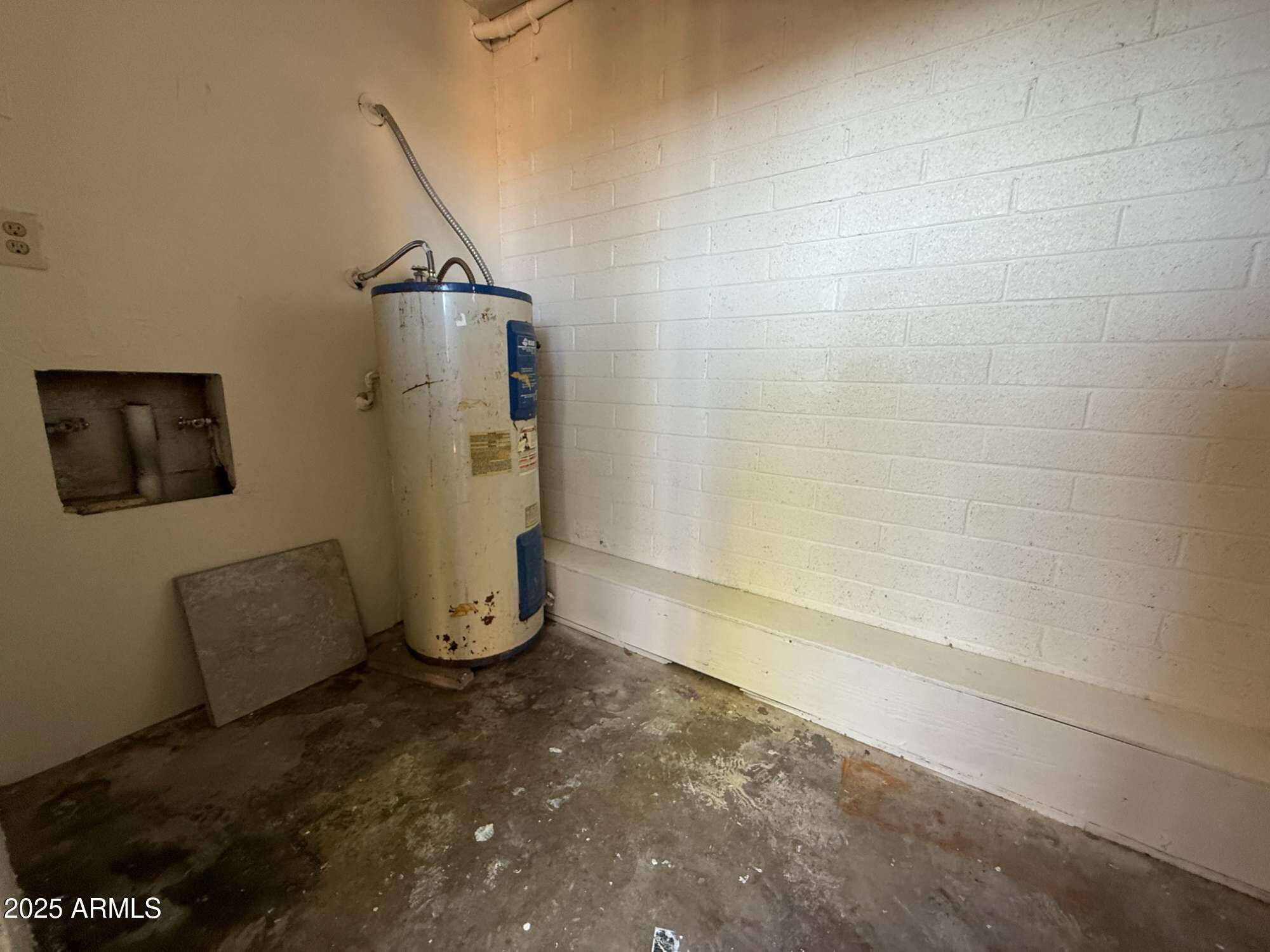 3947 West Wonderview Road Phoenix, AZ 85019 - Photo 16 of 16 a view of water heater room