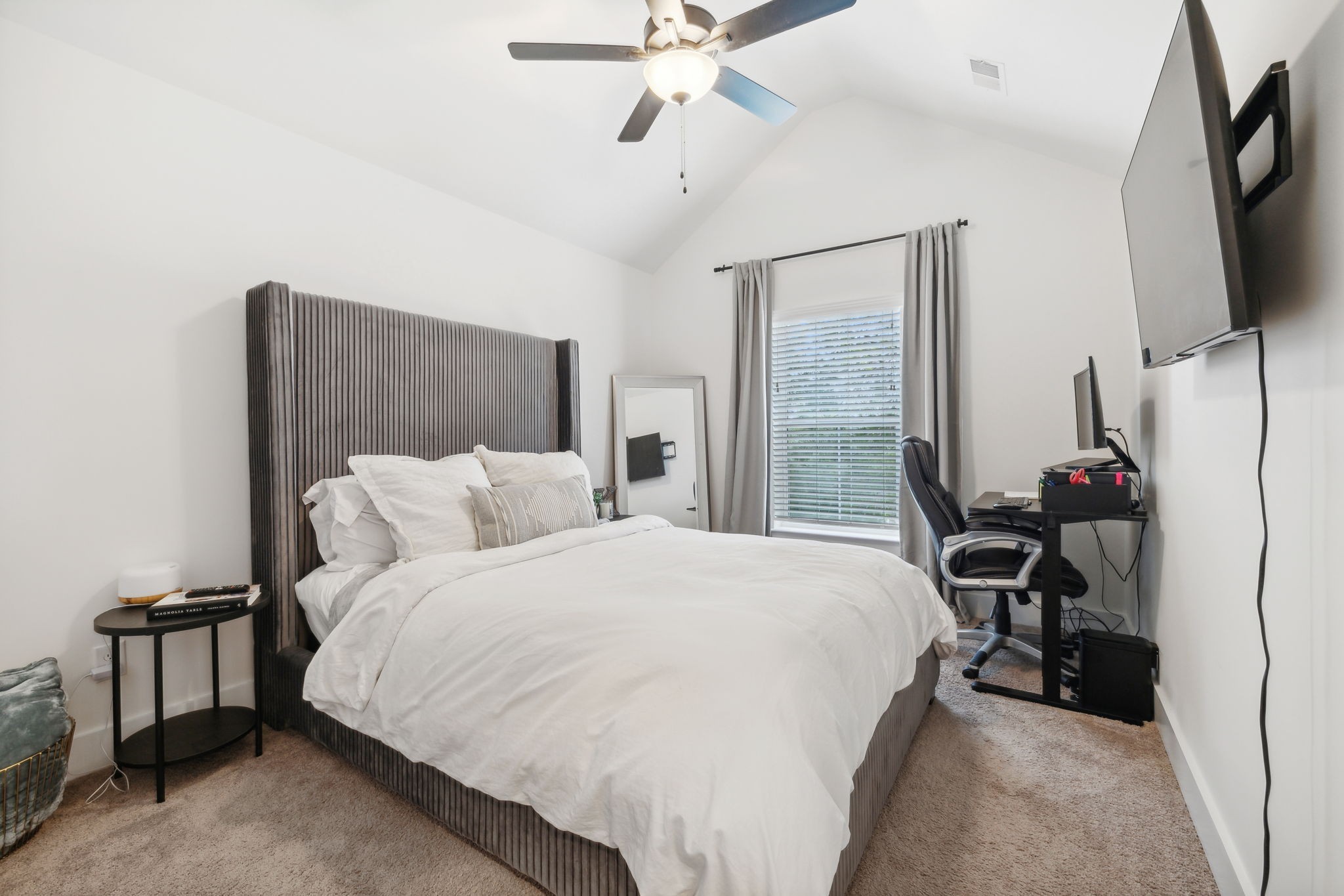 520 Taffy Way Hermitage, TN 37076 - Photo 24 of 31 a bedroom with a bed tv and a chandelier