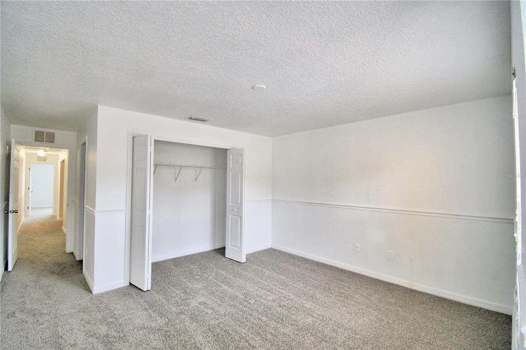 5359 River Rock Road Lakeland, FL 33809 - Photo 32 of 51 an empty room with closet
