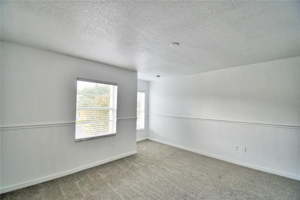 5359 River Rock Road Lakeland, FL 33809 - Photo 34 of 51 an empty room with windows