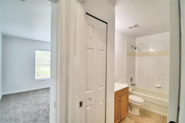a view of a swimming pool with a lounge chairs