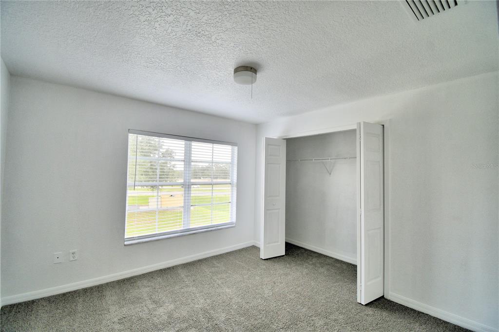 5359 River Rock Road Lakeland, FL 33809 - Photo 43 of 51 an empty room with windows
