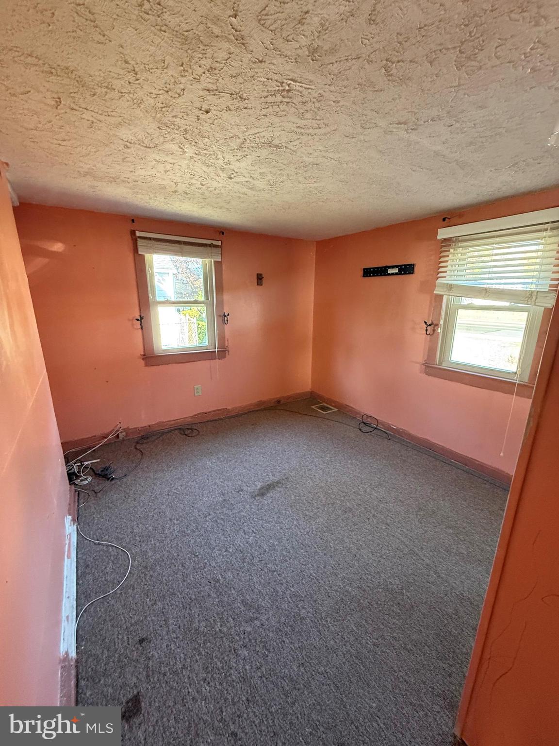 410 South Forklanding Road Maple Shade, NJ 08052 - Photo 11 of 13 an empty room with windows
