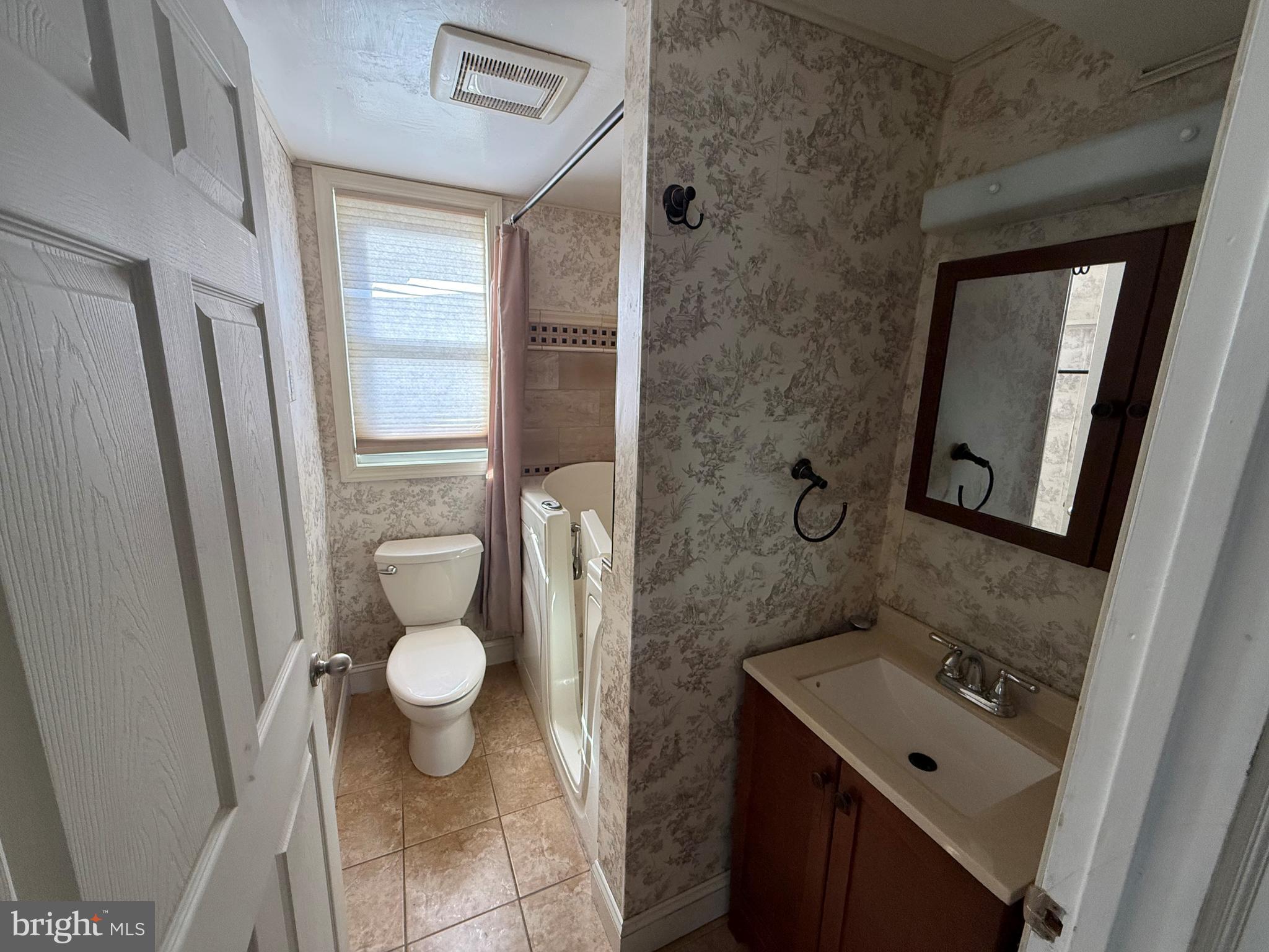 410 South Forklanding Road Maple Shade, NJ 08052 - Photo 12 of 13 a bathroom with a sink and a mirror