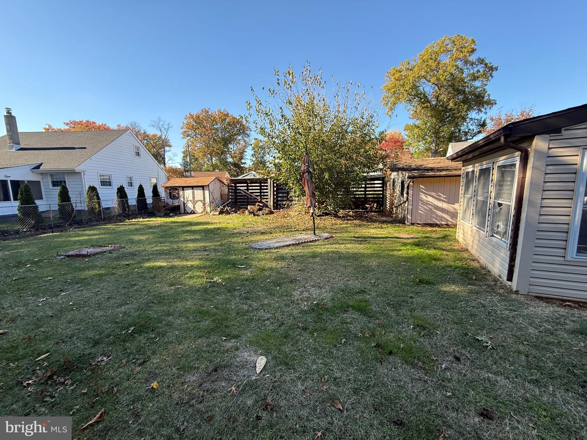 410 South Forklanding Road Maple Shade, NJ 08052 - Photo 5 of 13 a backyard of a house with table and chairs
