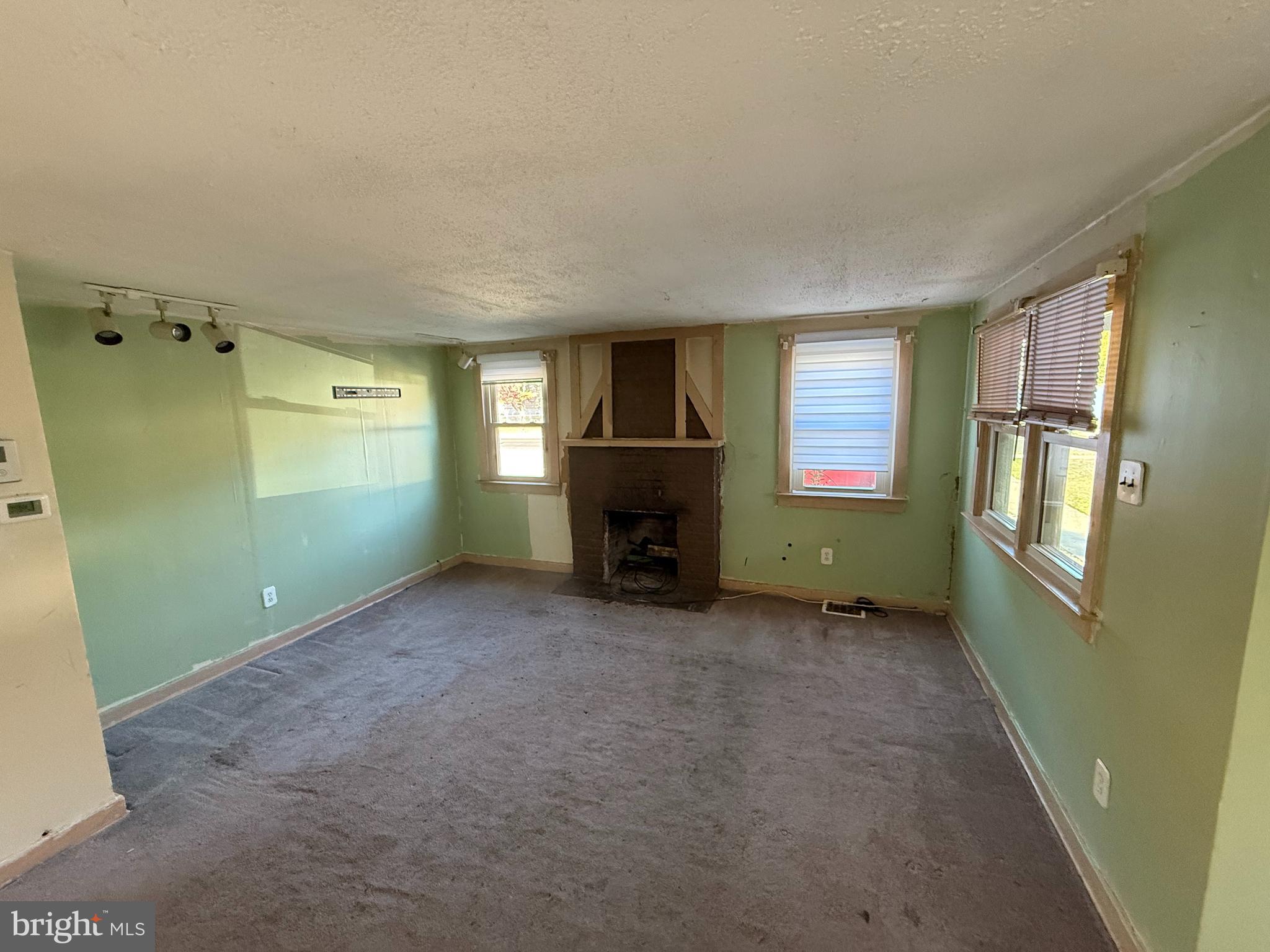 410 South Forklanding Road Maple Shade, NJ 08052 - Photo 7 of 13 a view of a livingroom with a fireplace