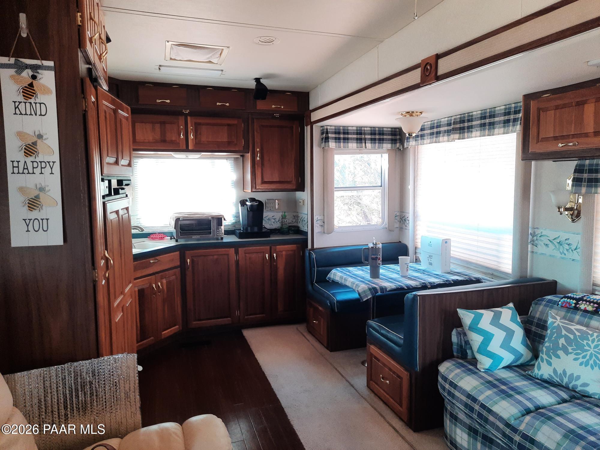 261 East W Titan Ranch Road Seligman, AZ 86337 - Photo 4 of 24 a kitchen with granite countertop lots of counter top space
