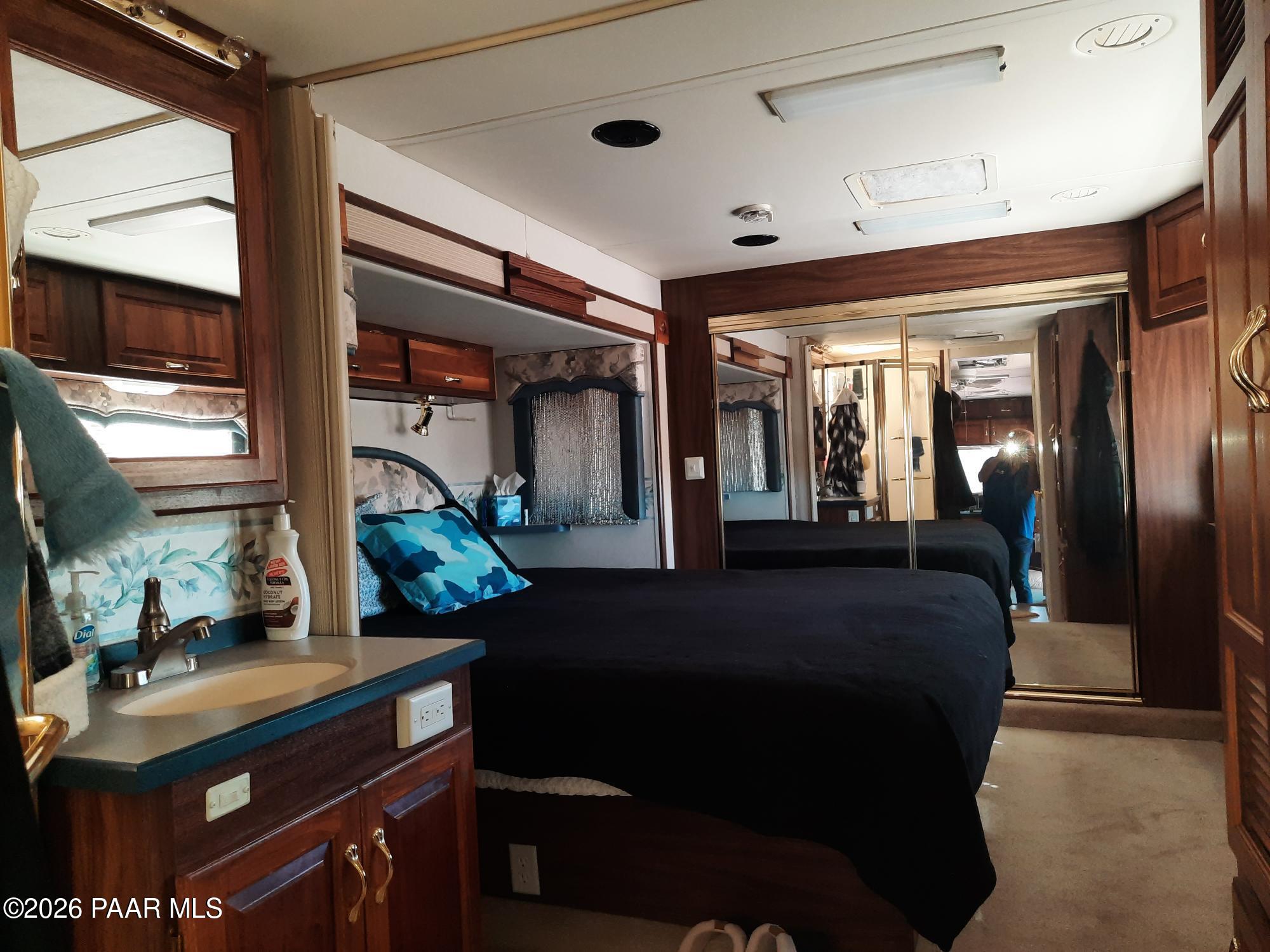 261 East W Titan Ranch Road Seligman, AZ 86337 - Photo 7 of 24 a living room with furniture and a potted plant