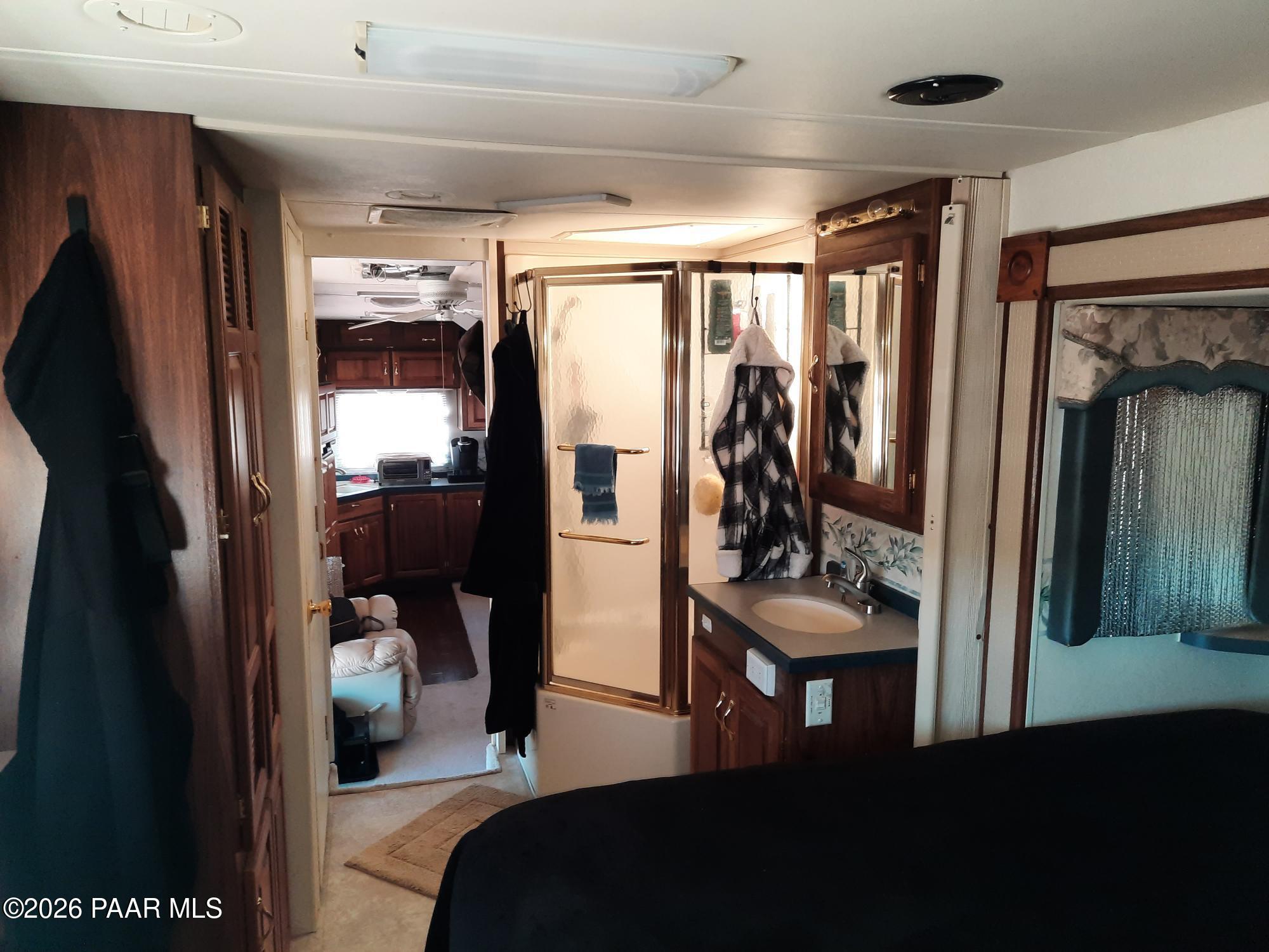 261 East W Titan Ranch Road Seligman, AZ 86337 - Photo 9 of 24 a view of a gallery with living room