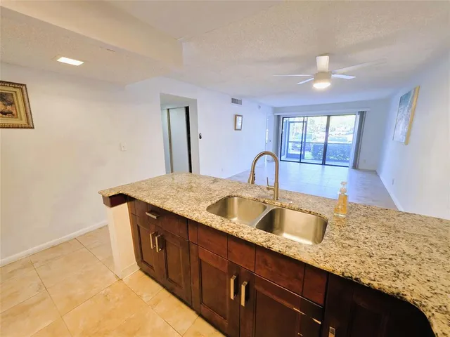 $179,500 | 2320 South Cypress Bend Drive, Unit 106, Pompano Beach, FL 33069