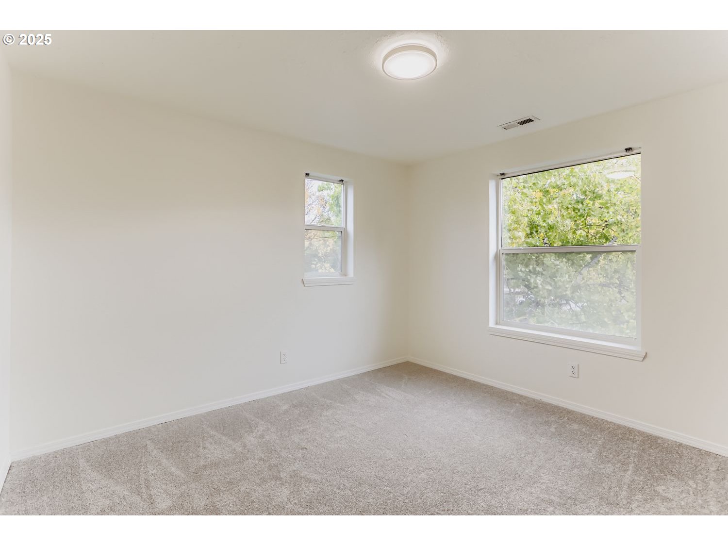 5626 North Williams Avenue Portland, OR 97217 - Photo 15 of 21 a view of an empty room with a window