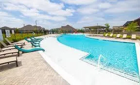 a view of a lake with a yard