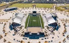 a view of a water fountain in front of a house