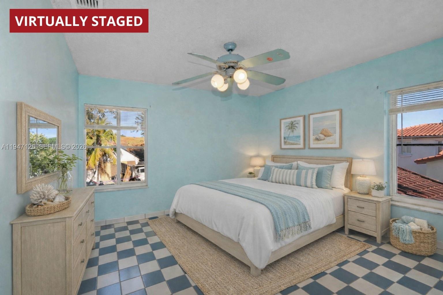 14826 Southwest 110th Terrace Miami, FL 33196 - Photo 22 of 40 a bedroom with a bed and a chandelier