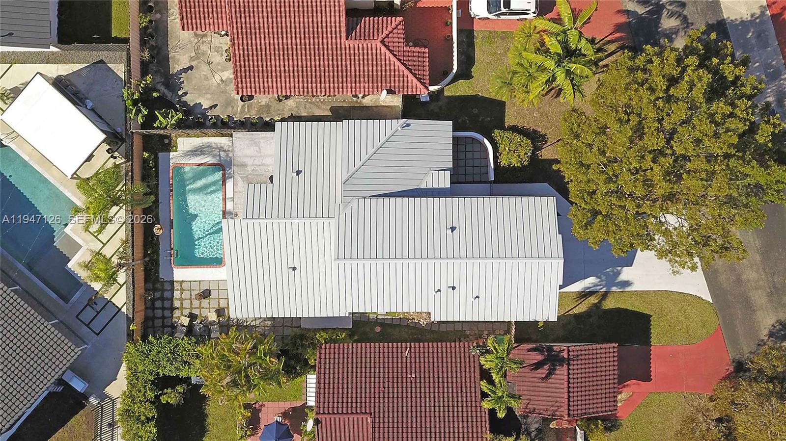 14826 Southwest 110th Terrace Miami, FL 33196 - Photo 32 of 40 an aerial view of a house with a yard