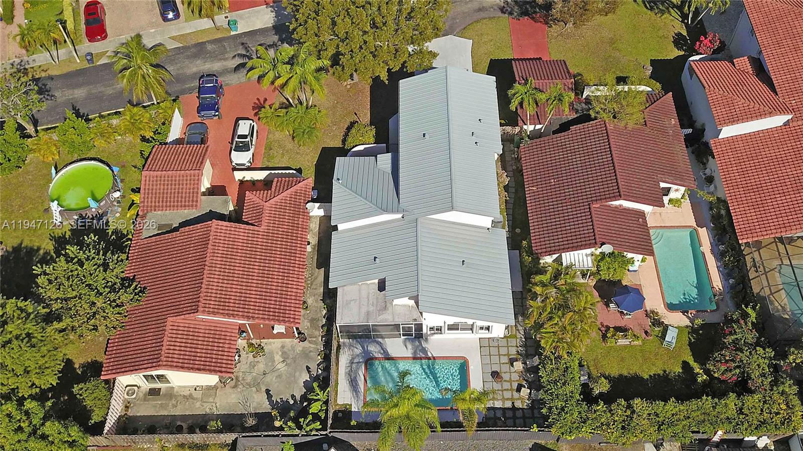 14826 Southwest 110th Terrace Miami, FL 33196 - Photo 33 of 40 an aerial view of houses and roads