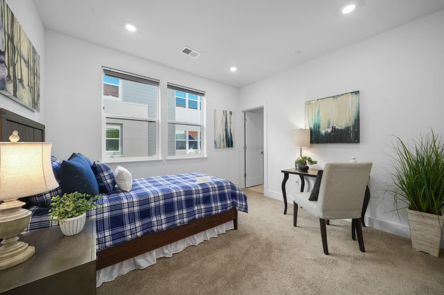 3029 Lamory Place Santa Clara, CA 95051 - Photo 12 of 25 a living room with a couch and potted plant