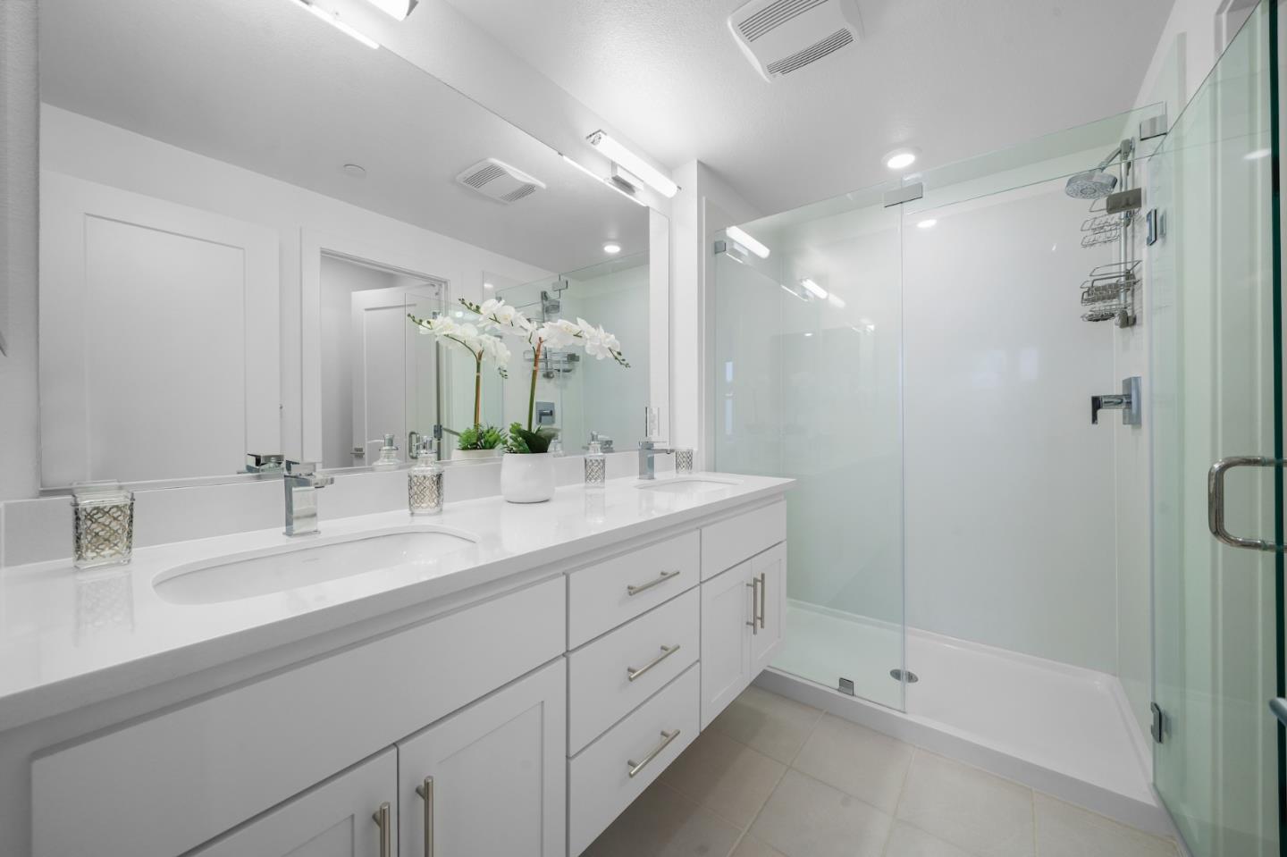 3029 Lamory Place Santa Clara, CA 95051 - Photo 14 of 25 a bathroom with a double vanity sink mirror double and shower