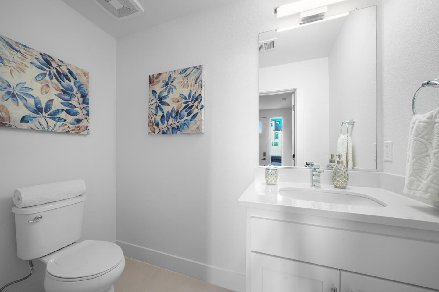 3029 Lamory Place Santa Clara, CA 95051 - Photo 16 of 25 a bathroom with a toilet a sink and a mirror