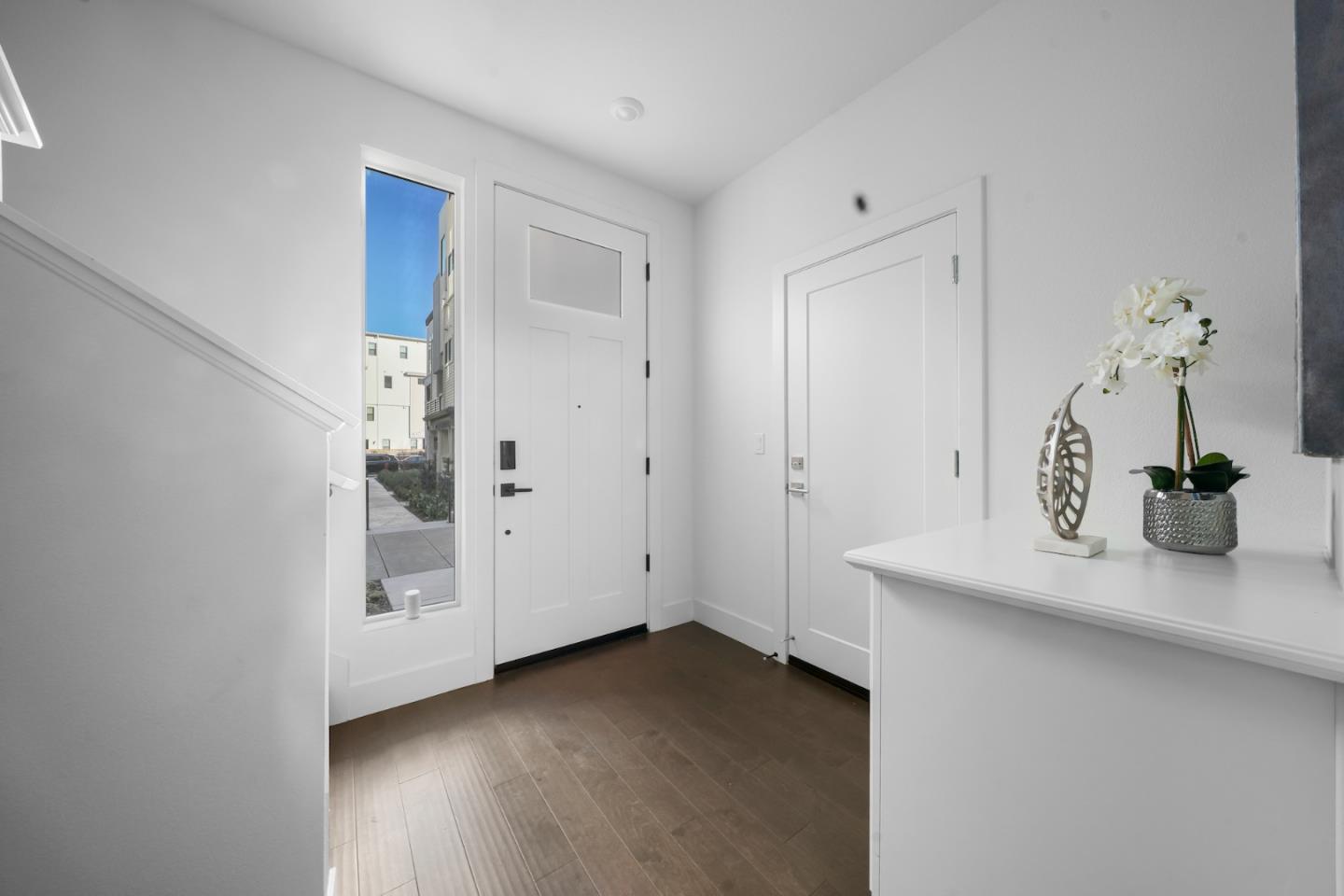 3029 Lamory Place Santa Clara, CA 95051 - Photo 17 of 25 a view of a hallway with wooden floor