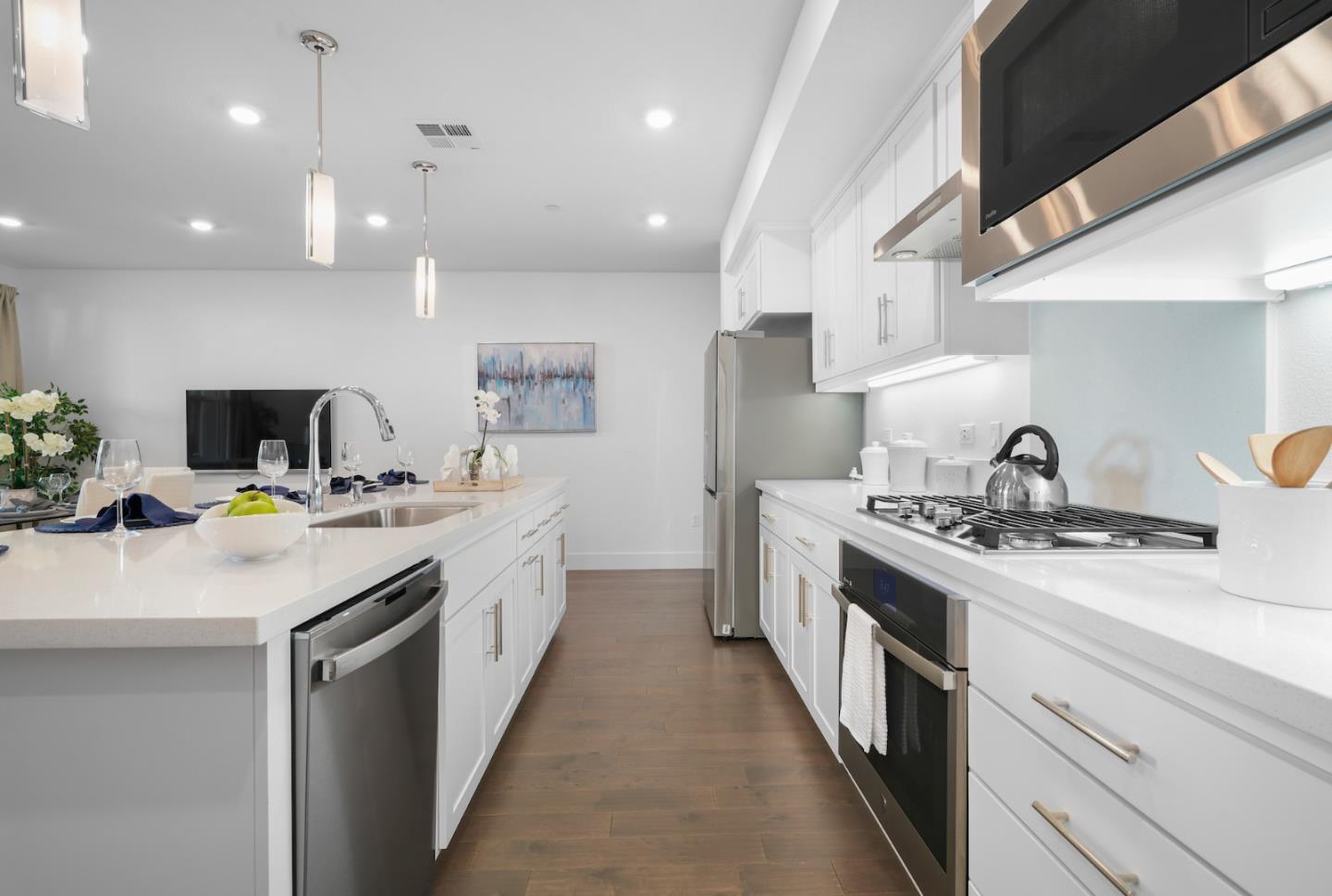 3029 Lamory Place Santa Clara, CA 95051 - Photo 5 of 25 a kitchen with stainless steel appliances a sink stove and cabinets