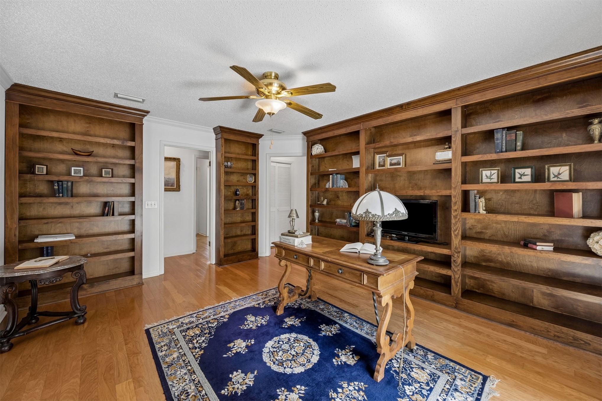 3110 Egans Bluff Road Fernandina Beach, FL 32034 - Photo 5 of 26 Lots of built-in bookcases in the library, adjacent to the living room.
