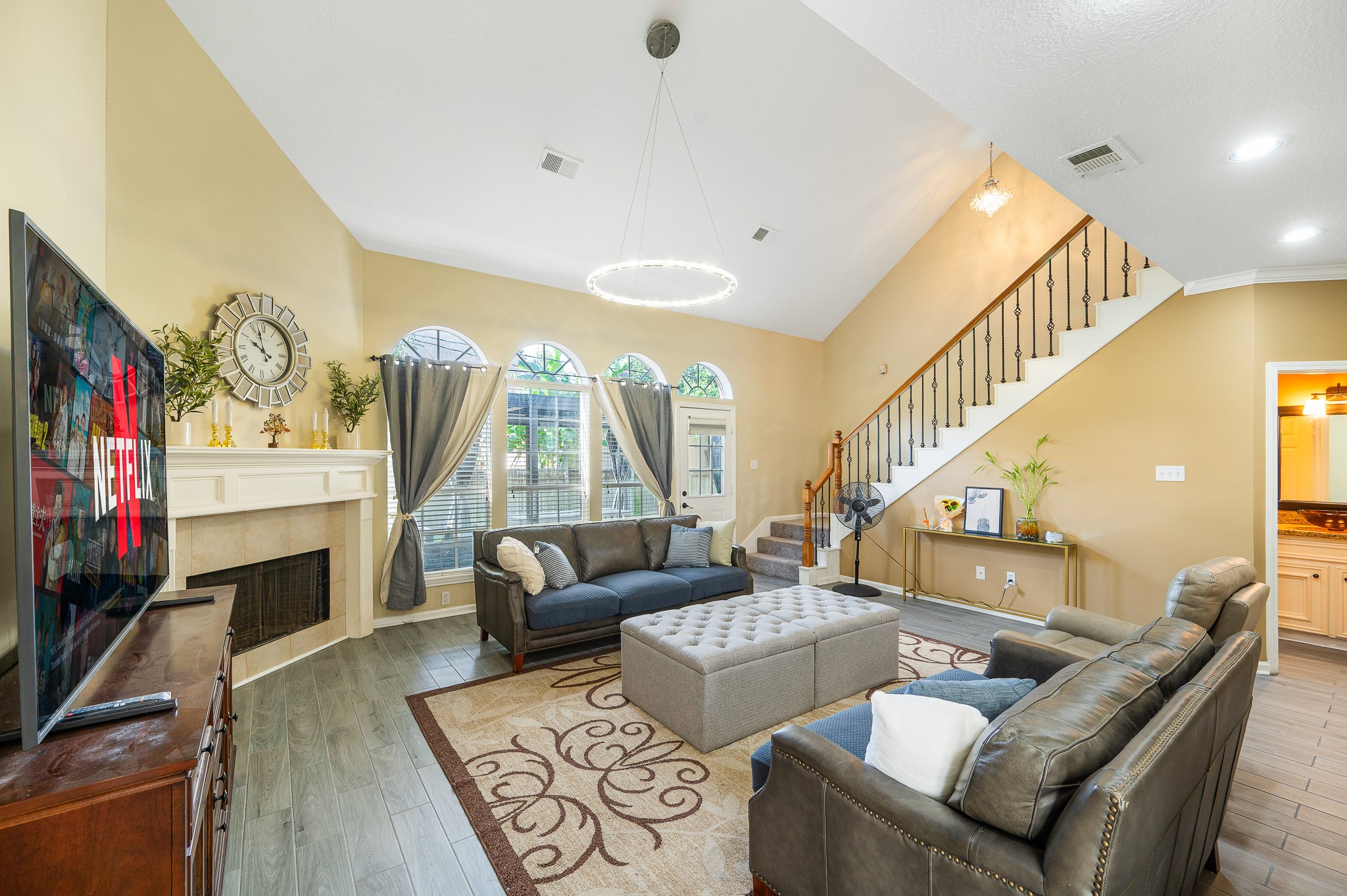 8111 Morningbrook Court Spring, TX 77379 - Photo 19 of 46 a living room with furniture and a flat screen tv
