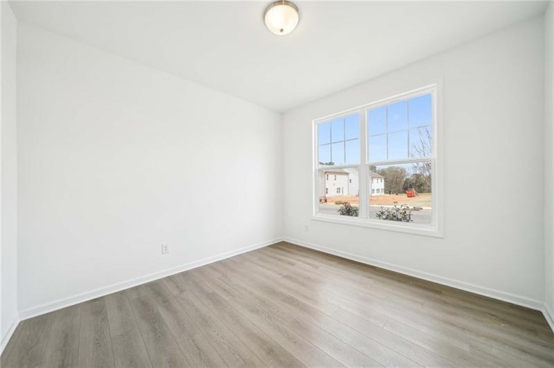 320 Silverleaf Trail Bethlehem, GA 30620 - Photo 16 of 36 a view of an empty room and window