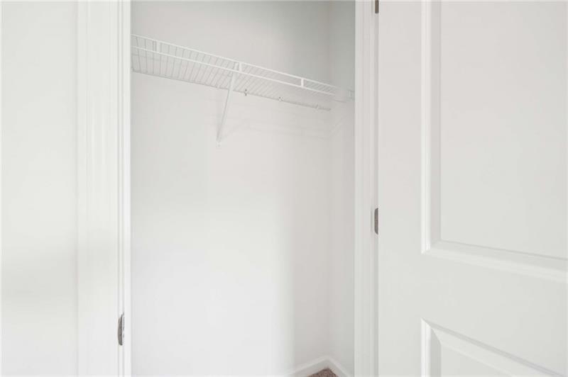 320 Silverleaf Trail Bethlehem, GA 30620 - Photo 19 of 36 a bathroom with a glass shower door