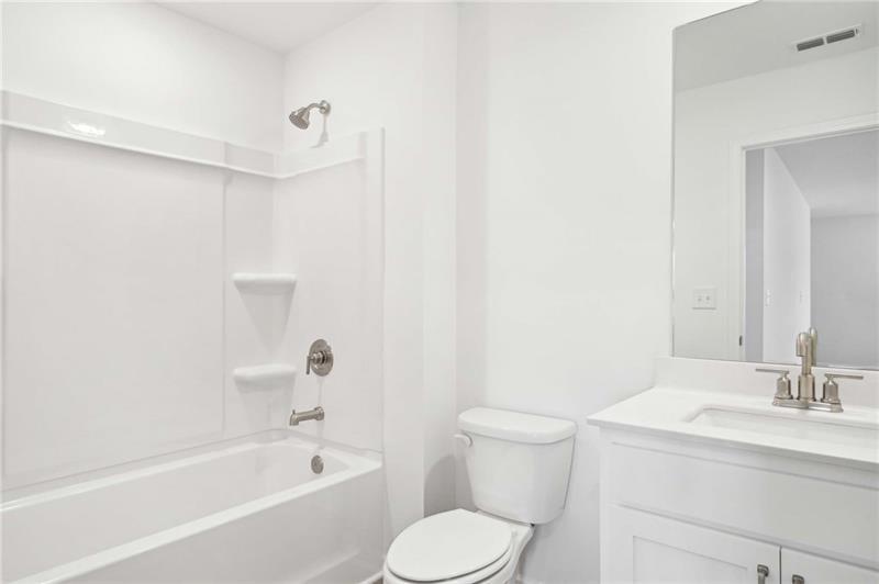 320 Silverleaf Trail Bethlehem, GA 30620 - Photo 25 of 36 a bathroom with a sink toilet and bathtub