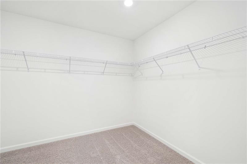 320 Silverleaf Trail Bethlehem, GA 30620 - Photo 30 of 36 a view of a room with racks on the wall