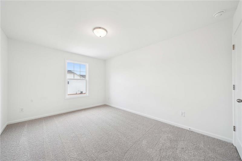 320 Silverleaf Trail Bethlehem, GA 30620 - Photo 32 of 36 an empty room with a window