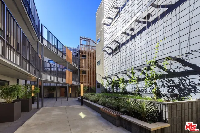 a front view of a building with glass door and glass door