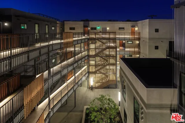 a view of a swimming pool with a lounge chair
