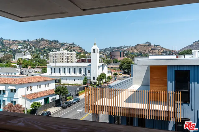 a view of a city with tall buildings