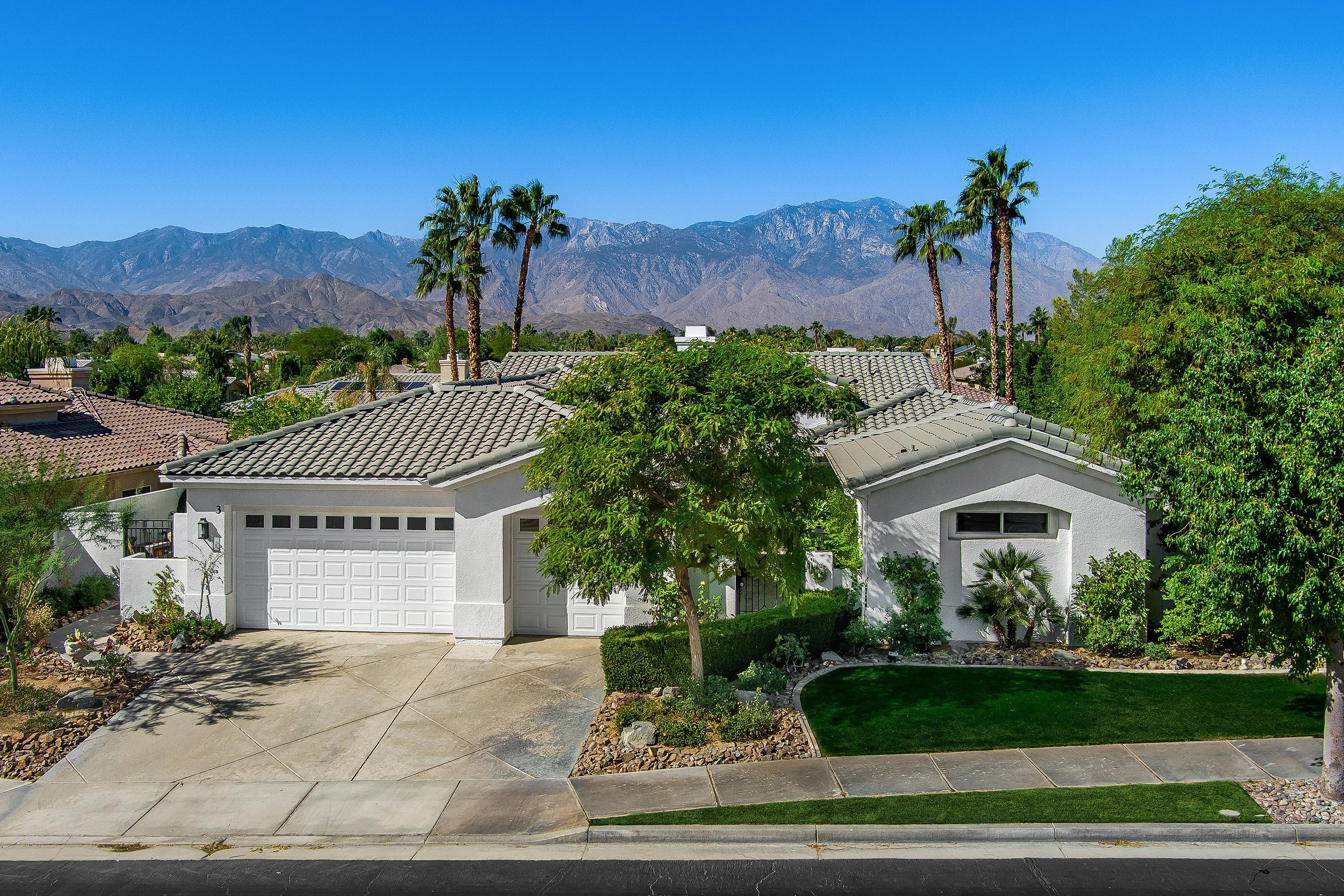 3 Trafalgar Rancho Mirage, CA 92270 - Photo 1 of 42 a front view of a house with a yard and garage